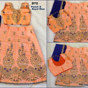 May include: Peach and royal blue girls' lehenga choli with gold embroidery and sequins. The choli has a sleeveless design and the skirt has a flared silhouette. The set includes a dupatta.
