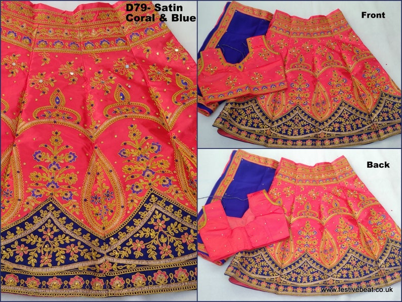 May include: A coral and blue satin lehenga with gold and blue embroidery. The lehenga has a blue border and a matching coral and blue blouse.