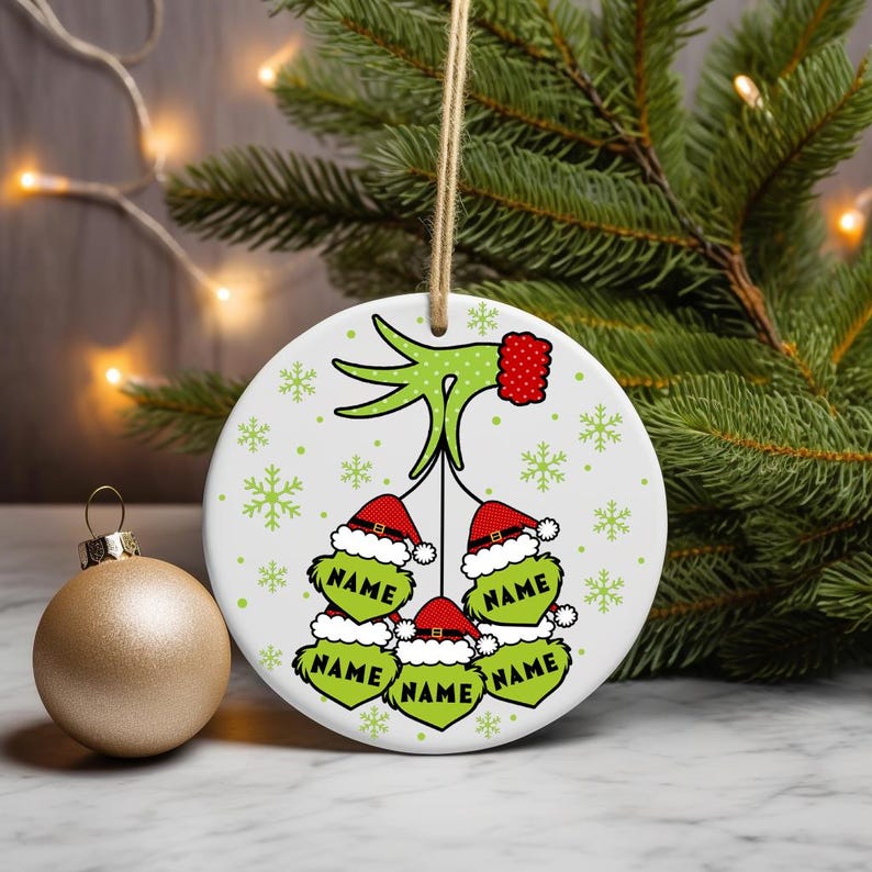 Digital PNG sublimation design for a custom family Christmas ornament, featuring personalized names on a round holiday template.