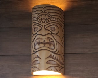 12"H Tiki Mask Ceramic Up/Down Wall Sconce in Choice of Dark Teak or Amber Palm Finish