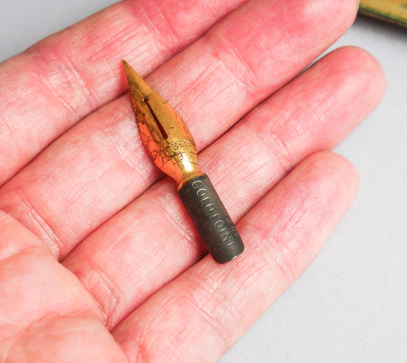 Antique small gold plated pen nib, original patina, Perry Co, Antique small gold plated pen nib, original patina, Perry Co,
