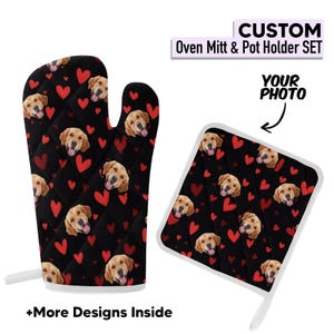 May include: A black oven mitt and pot holder set featuring a repeating pattern of golden retriever faces and red hearts. The text "CUSTOM Oven Mitt & Pot Holder SET" is visible. The pot holder has a white border and loop.