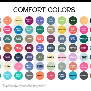 May include: A color chart titled "Comfort Colors" featuring a variety of hues. Each color is displayed in a circular swatch with its name underneath. Colors range from white to black, including shades of blue, green, pink, and orange. The W Shop Studio logo is at the bottom.