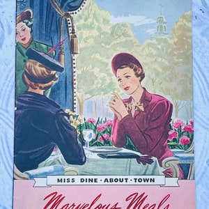 May include: A vintage advertisement for Minute Tapioca featuring two women in hats sitting at a table outdoors. The text reads "Miss Dine-About-Town, Marvelous Meals with Minute Tapioca".