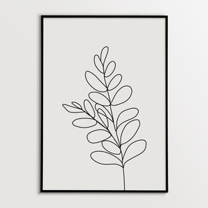 May include: Black framed art print featuring a minimalist line drawing of a plant with oval-shaped leaves. The artwork is set against a neutral background, creating a modern and simple aesthetic. The black frame adds a touch of contrast.