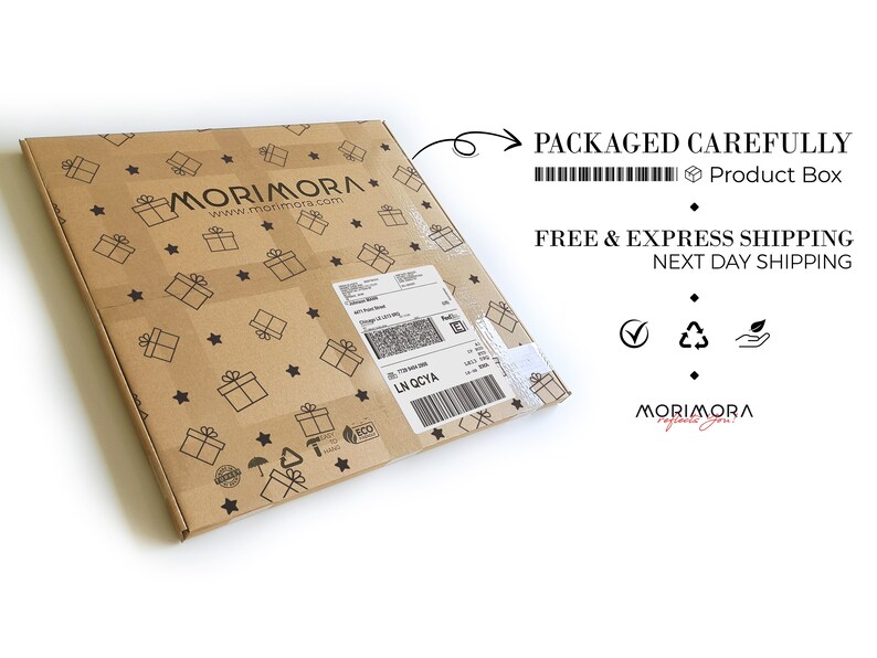 May include: A brown cardboard box with a white label and barcode. The box is decorated with a pattern of stars and gift boxes. The text "MORIMORA" is printed on the box. The text "PACKAGED CAREFULLY" and "FREE & EXPRESS SHIPPING" is printed on a white background.