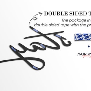 May include: Black metal word art that says "grate" with double-sided tape attached. The package includes double-sided tape with the product. The text "MORIMORA reflects you!" is also visible.