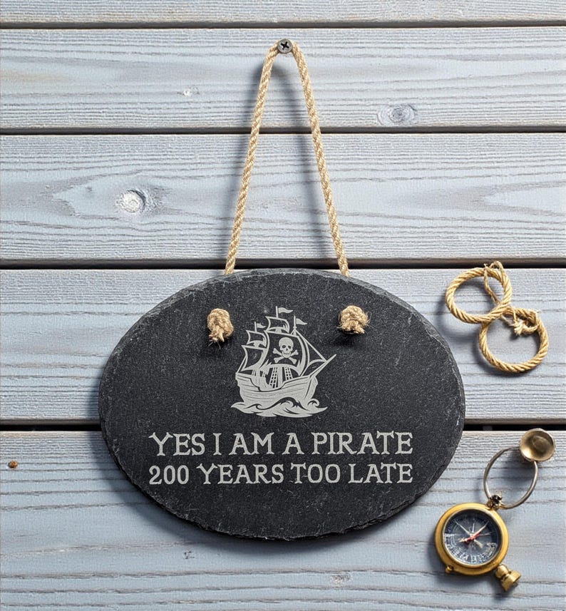 Pirate Looks at 40 slate hanging sign, laser engraved, with rope.  Jimmy Buffet Gift