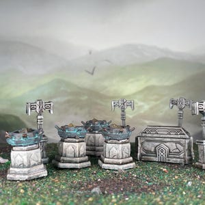 May include: A set of three ceramic mugs with a speckled, matte finish. The mugs are in shades of cream, light gray, and dark gray. Each mug has a simple, minimalist design, perfect for coffee or tea.