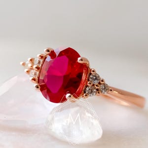 Oval Cut Ruby and Diamond Cluster Ring