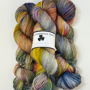 Scream is handdyed fingering weight superwash wool. It is 415 yards and is 75 percent merino and 25 percent nylon, perfect for socks.