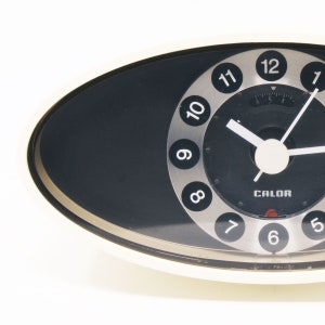 space age alarm clock HEAT