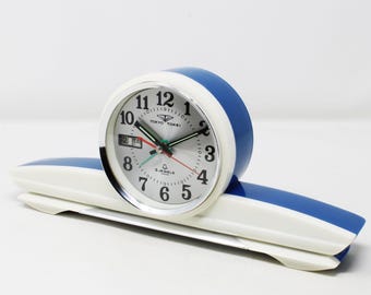 Vintage Tokyo Tokei 1844 UFO wekker uit de jaren 60 met ruimtevaartthema – Dag-/datumkalender – Mechanisch handopwindmechanisme – Wit en blauw – Zeldzaam