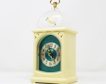 Reloj animado vintage Impex 7RY001 pájaro NOS (New Old Stock)