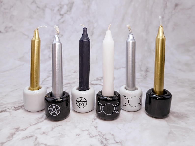 Six chime candle holders with gold and silver candles