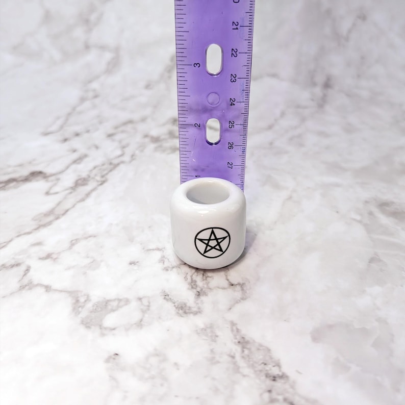 Ceramic witchcraft candle holder, used in spell crafting