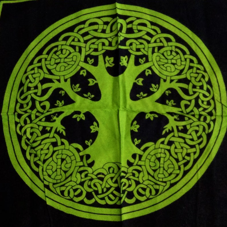 May include: A green Celtic tree of life design on a black background. The tree is surrounded by a circle of intricate knots.