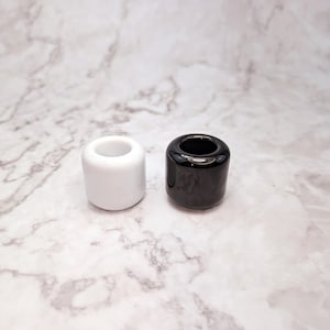 Black and white chime candle holders, for Wiccan rituals