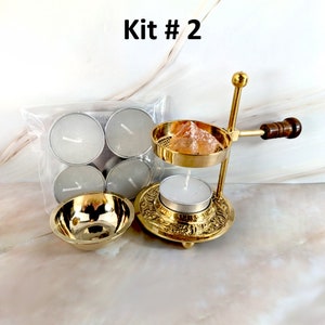May include: Brass incense burner kit with a handle, a small bowl, and a pack of tea lights. The burner has a metal mesh and a small candle holder. The kit is labelled "Kit #2".