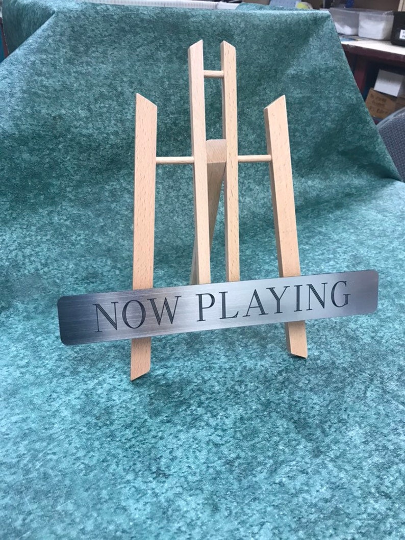 Record display stand Now playing