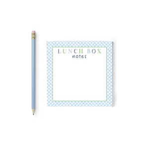 May include: A blue and white gingham notepad with the text "LUNCH BOX notes" in green and blue letters.