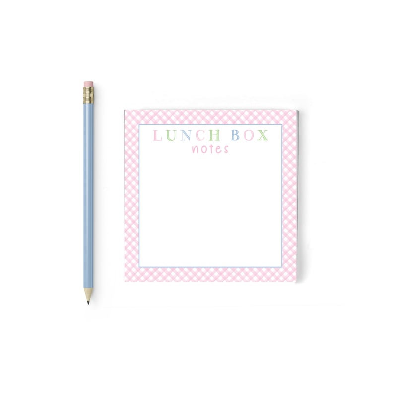 May include: Pink and white gingham notepad with the text "LUNCH BOX notes" in colorful letters.