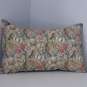 Classic William Morris Golden Lily Cushion with green velvet back.