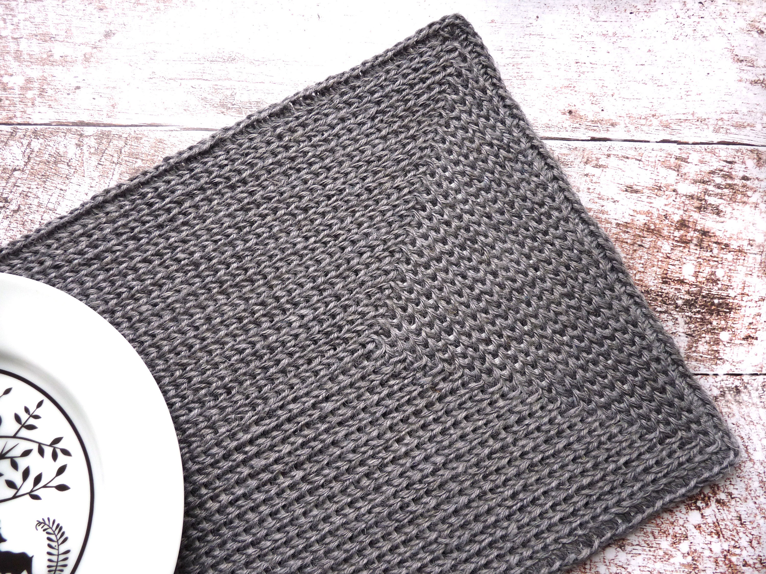 Grey jute rectangular placemat made with a rubber base in a Etsy