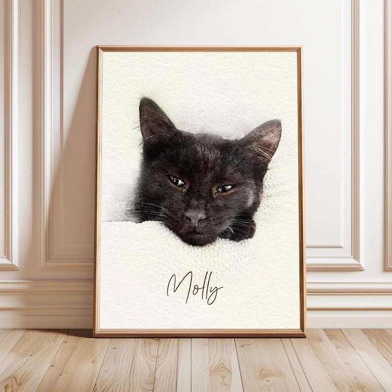 May include: A framed wall art print featuring a black cat resting on a textured white surface. The cat is positioned in the upper center of the print, and the name Molly is written in a black cursive script font below the cat on the white background.
