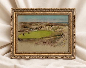 May include: A framed print featuring a landscape painting of a golf course with a bright green putting area, sand dunes, and figures playing golf. The artwork is enclosed in an ornate, textured gold-colored frame with intricate detailing.