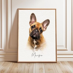 May include: A framed portrait print featuring a brown and tan French Bulldog with large ears and a black muzzle. The dog has a small white patch on its chest. Below the dog, the name Maisie is written in a thin, black, cursive script font.