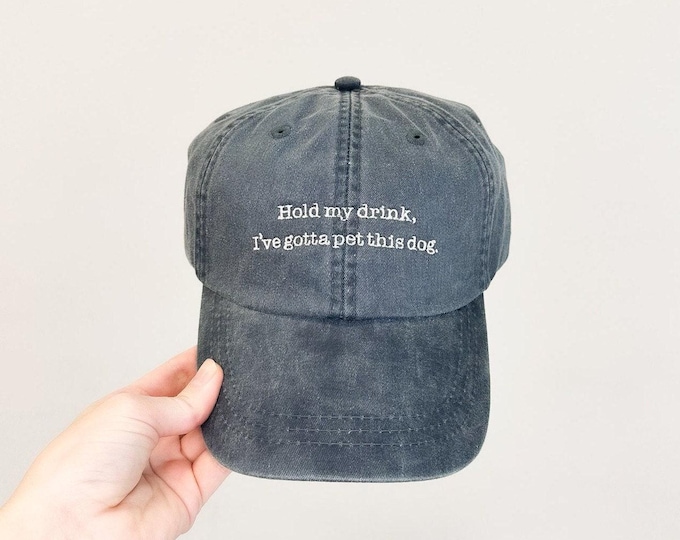 Hold My Drink, I've Gotta Pet This Dog Embroidered Pigment-Dyed Baseball Cap (Typewriter Font)