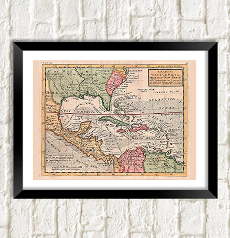 May include: An antique map of the West Indies and Mexico from 1733. The map is printed on paper and features a detailed illustration of the Caribbean islands and the surrounding coastline. The map is framed in black and has a white background.