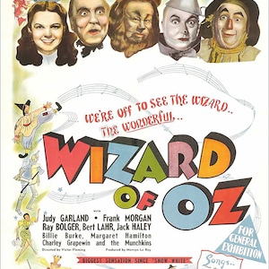 May include: A vintage movie poster for the 1939 film "The Wizard of Oz" featuring Judy Garland as Dorothy, Ray Bolger as the Scarecrow, Jack Haley as the Tin Man, Bert Lahr as the Cowardly Lion, and Margaret Hamilton as the Wicked Witch of the West. The poster features the title "The Wizard of Oz" in large, colorful letters and the tagline "We're off to see the Wizard... The Wonderful..." in smaller letters.