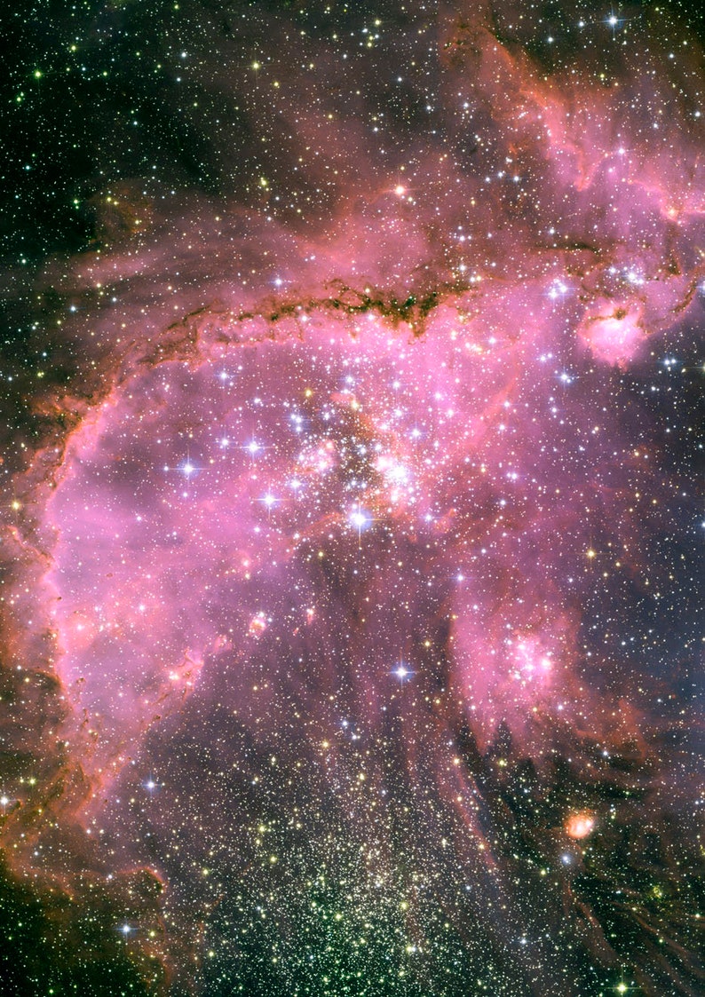 May include: A vibrant pink nebula with a cluster of bright white stars in the center. The nebula is surrounded by a field of smaller, fainter stars.