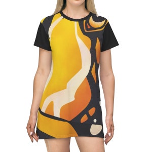 May include: A black and yellow t-shirt dress with a butterfly wing pattern.