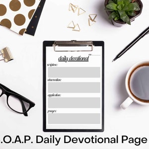 May include: A black clipboard with a "Daily Devotional" page, featuring sections for scripture, observation, application, and prayer. The page is surrounded by office supplies, including a pen, glasses, and a cup of coffee. The text "S.O.A.P. Daily Devotional Page" is at the bottom.