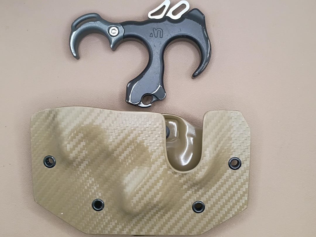Déclencheur Arc 3 Doigts Aide à La Libération 3 Doigts Pour Tir à L'arc – Poignée étrier – Pour Chasse Ou Plein Air – Noir Couteaux Gerber Déclencheur Arc 3 Doigts Aide à La Libération 3 Doigts Pour Tir à L'arc – Poignée étrier – Pour Chasse Ou Plein Air – Noir Couteaux Gerber