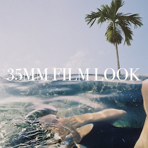 May include: A person swims underwater in a pool with a palm tree in the background. The text "35MM FILM LOOK" is superimposed over the image.