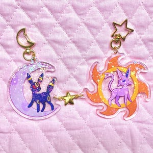 Espeon/Umbreon sol/måne matchande nyckelringar