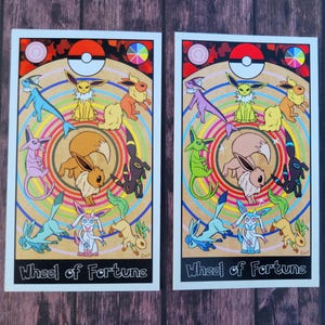 May include: A colorful illustration of the Wheel of Fortune tarot card featuring a circle of nine Eevee evolutions. The card is set against a background of a wooden table. The card features the text "Wheel of Fortune".