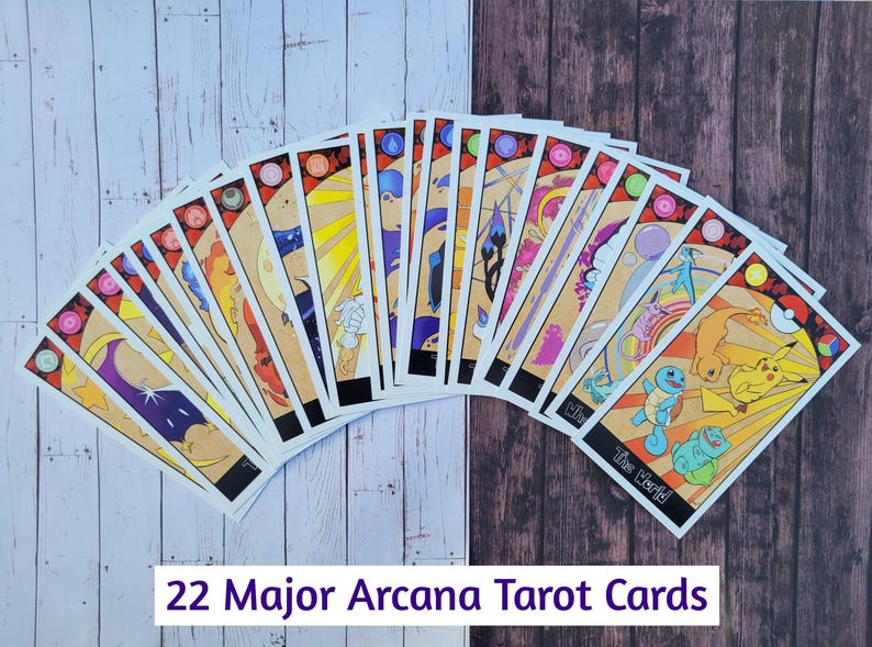 May include: A set of 22 Major Arcana Tarot cards featuring Pokemon characters. The cards are arranged in a fan shape, with the backs of the cards facing the viewer. The cards are colorful and feature various Pokemon characters, including Pikachu, Charizard, and Squirtle.
