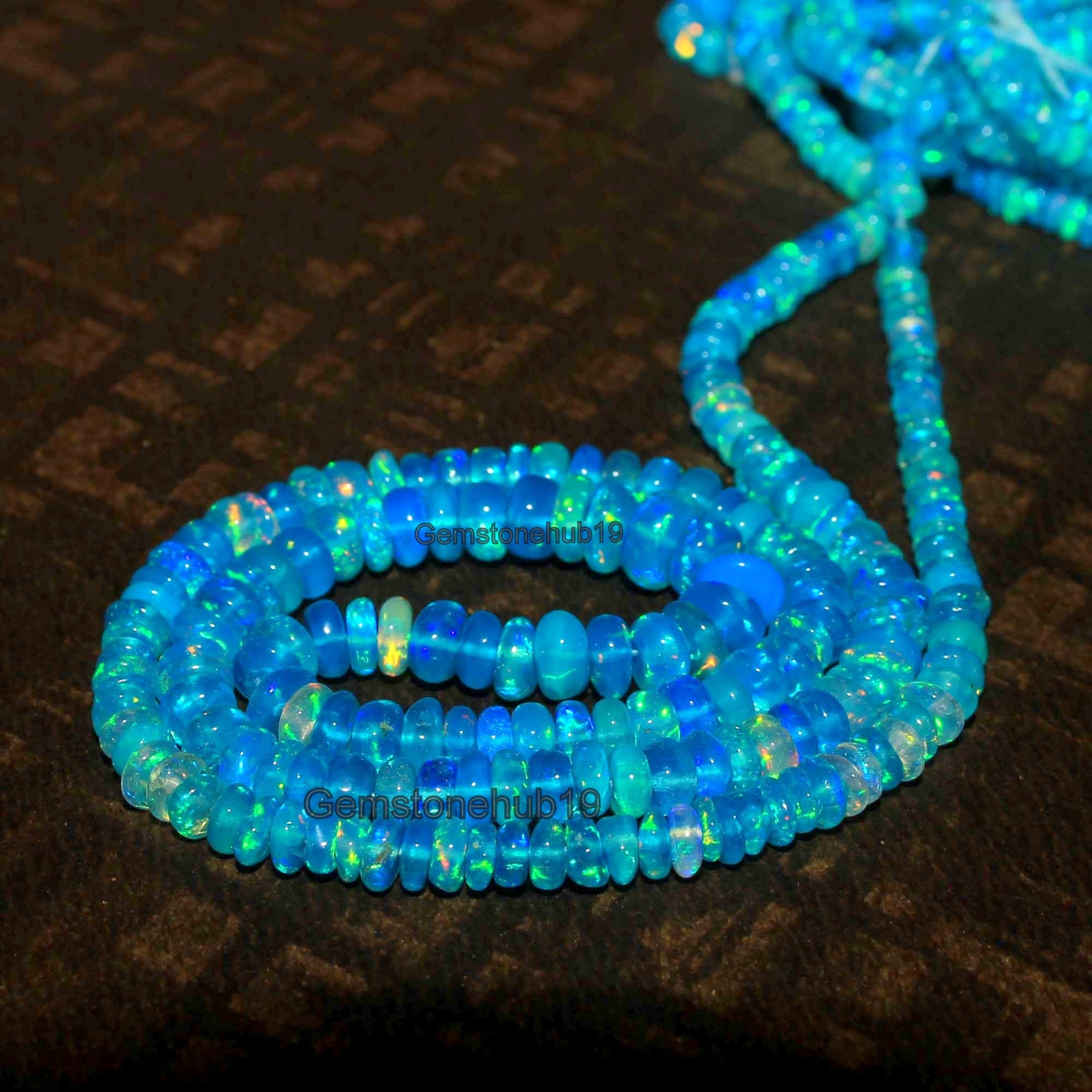AAA+ Ethiopian Opal Beads: Black Smooth Round Gemstone Strand