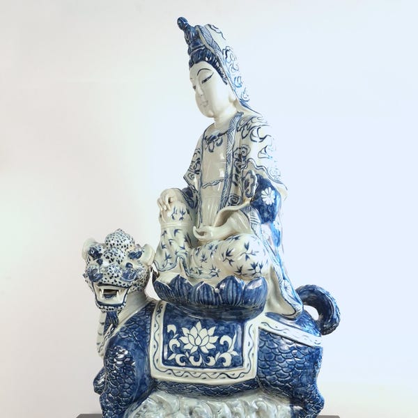 Chinese blue and white porcelain seated Kuan Yin on a qilin