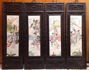 Juego de cuatro placas grandes de estilo chino con escenas de jardines.