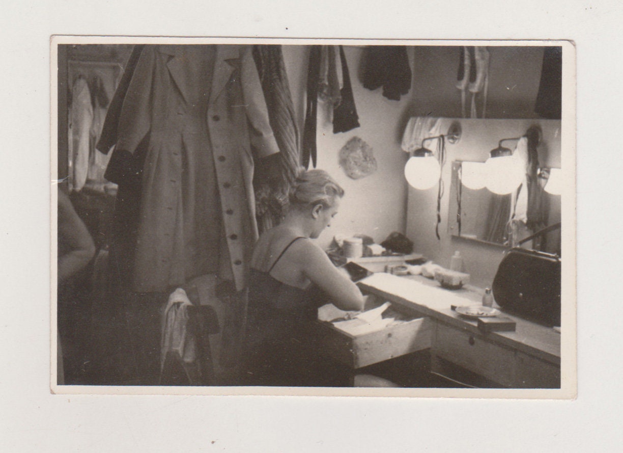Beautiful Young Woman at Vanity Unaware of Being Photographed Backstage Snapshot Original Vernacular Found Photo