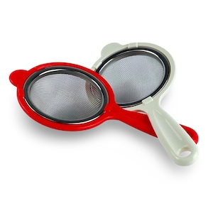 May include: Two kitchen strainers with mesh bottoms and plastic handles. One strainer is red and the other is white.