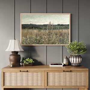 Close-up of botanical wildflower field artwork with soft vintage landscape tones