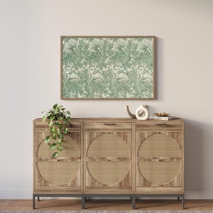Framed William Morris art print styled above wood console