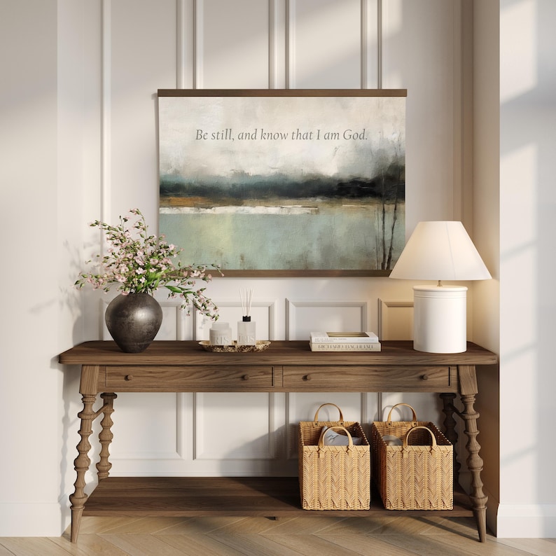Be Still and Know abstract canvas tapestry wall hanging in soft muted tones, featuring minimalist Christian scripture wall art.